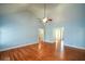 Spacious living room with hardwood floors, high ceilings, and lots of natural light at 6865 Cowan Mill Rd, Winston, GA 30187