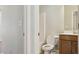 This is a bathroom with a toilet, sink, and a bathtub and the walls are light yellow at 2638 Lake Manor Cir, Duluth, GA 30096