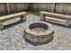 This cozy backyard features a stone fire pit area perfect for outdoor relaxation and entertaining guests at 2638 Lake Manor Cir, Duluth, GA 30096