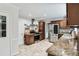 Kitchen featuring stainless steel appliances, granite countertops, and wooden cabinets at 2771 Kenwood Dr, Duluth, GA 30096