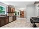 Kitchen featuring stainless steel appliances, granite countertops, and wooden cabinets at 2771 Kenwood Dr, Duluth, GA 30096