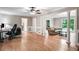 Open-concept living room showcasing hardwood floors and abundant natural light at 2771 Kenwood Dr, Duluth, GA 30096