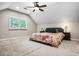Large main bedroom features a ceiling fan, natural light, and neutral walls at 2771 Kenwood Dr, Duluth, GA 30096