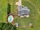 An aerial view of a home's backyard with a swimming pool and outdoor space, perfect for relaxation at 3905 Pointer Rd, Loganville, GA 30052