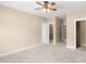 Carpeted bedroom featuring multiple closets and entryways, providing ample storage and easy access at 3905 Pointer Rd, Loganville, GA 30052