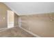 Attic closet with built-in shelving offering organized storage at 3905 Pointer Rd, Loganville, GA 30052