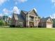 Spacious two-story home with a two car attached and a one car detached garage at 3905 Pointer Rd, Loganville, GA 30052