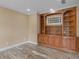 Office with built-in bookcase and wood-look tile flooring at 3905 Pointer Rd, Loganville, GA 30052
