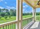 Relaxing patio with green outdoor views and ceiling fan at 3905 Pointer Rd, Loganville, GA 30052