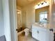 Clean, modern bathroom with a glass-enclosed shower and white vanity at 500 Healy Dr # 77, Cumming, GA 30040