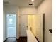 Hallway with laundry closet at 500 Healy Dr # 77, Cumming, GA 30040