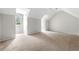 Large room featuring vaulted ceilings and a window with natural light at 1560 Heritage Trl, Roswell, GA 30075