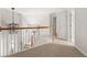 Elegant foyer with wood railing staircase and a modern chandelier at 1560 Heritage Trl, Roswell, GA 30075