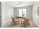 Bright home office with a neutral color palette, streamlined desk, and matching chairs at 1560 Heritage Trl, Roswell, GA 30075