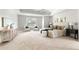 Spacious main bedroom with trey ceiling, sitting area, and neutral décor at 1560 Heritage Trl, Roswell, GA 30075