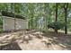 Exterior view of property grounds featuring a large area and a shed at 3657 Linda Dr, Loganville, GA 30052