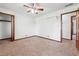 Bedroom with neutral carpet, ceiling fan, and closet at 3657 Linda Dr, Loganville, GA 30052