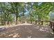 Expansive outdoor deck area perfect for entertaining and relaxing, surrounded by lush trees at 3657 Linda Dr, Loganville, GA 30052