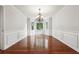 Bright dining room with beautiful hardwood floors and large windows at 3657 Linda Dr, Loganville, GA 30052