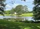 Beautiful view of the pond and wooded land at 3657 Linda Dr, Loganville, GA 30052