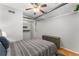 Bright bedroom featuring neutral decor, wood floors, and a modern ceiling fan at 800 Peachtree Ne St # 8612, Atlanta, GA 30308