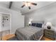 Cozy bedroom with a ceiling fan, neutral decor, and an en-suite bathroom at 800 Peachtree Ne St # 8612, Atlanta, GA 30308
