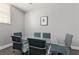 Modern conference room with glass table, comfortable seating and natural lighting at 800 Peachtree Ne St # 8612, Atlanta, GA 30308
