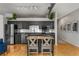 Modern kitchen boasts stainless appliances, sleek cabinetry, an island, and access to the hallway at 800 Peachtree Ne St # 8612, Atlanta, GA 30308