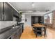 Kitchen with stainless appliances, sleek backsplash, granite counters, and an island seating area at 800 Peachtree Ne St # 8612, Atlanta, GA 30308