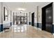Bright lobby with tiled floor, elevator access, and neutral colored decor at 800 Peachtree Ne St # 8612, Atlanta, GA 30308