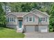 Charming two-story home with a two car garage and nicely manicured lawn at 323 Bells Ferry Ne Rd, White, GA 30184