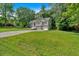 Charming two-story home with a two car garage and nicely manicured lawn at 323 Bells Ferry Ne Rd, White, GA 30184