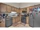 Well-equipped kitchen with stainless steel appliances, ample cabinetry, and neutral countertops at 323 Bells Ferry Ne Rd, White, GA 30184