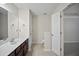 Bright bathroom featuring a single sink vanity and tile flooring at 1278 Houndslake Dr, Marietta, GA 30008