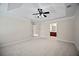 Expansive main bedroom boasts neutral carpet, tray ceiling, and ensuite bathroom at 1278 Houndslake Dr, Marietta, GA 30008