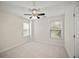 Bright bedroom featuring a ceiling fan, carpet, and two windows that provide natural light at 1278 Houndslake Dr, Marietta, GA 30008