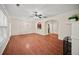 Open-concept living space featuring hardwood floors, arched entryways, and ample natural light at 1278 Houndslake Dr, Marietta, GA 30008