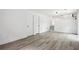 Finished basement with two doors and luxury vinyl plank flooring at 4148 Emerald North Dr, Decatur, GA 30035