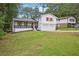 Well-maintained two-story home with a spacious front yard and inviting curb appeal at 4148 Emerald North Dr, Decatur, GA 30035