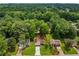 Charming home with a well-manicured lawn and mature trees in a desirable neighborhood at 2090 Rocky Mill Drive, Lawrenceville, GA 30044