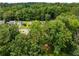 Discover this home surrounded by mature trees, offering privacy and a sense of natural beauty at 2090 Rocky Mill Drive, Lawrenceville, GA 30044