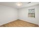 Comfortable bedroom with light wood floors and natural light at 2090 Rocky Mill Drive, Lawrenceville, GA 30044