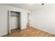 Bedroom with closet and light-colored wood floors at 2090 Rocky Mill Drive, Lawrenceville, GA 30044