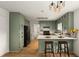 Updated kitchen with ample counter space, modern appliances, and stylish pendant lighting at 2090 Rocky Mill Drive, Lawrenceville, GA 30044