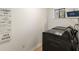 Well-lit laundry room with modern appliances and decorative wall art at 2090 Rocky Mill Drive, Lawrenceville, GA 30044