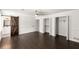 Spacious bedroom with a barn door leading to an en-suite bathroom and ample closet space at 2090 Rocky Mill Drive, Lawrenceville, GA 30044