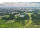 Beautiful aerial view featuring local parks, trails, lake, and a city skyline at 38 Mildred Nw Pl, Atlanta, GA 30318