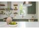 Stylish kitchen boasts open shelving and stainless appliances at 38 Mildred Nw Pl, Atlanta, GA 30318