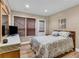 Cozy bedroom with wood floors, natural light, and charming decor at 660 Briarleigh Way, Woodstock, GA 30189