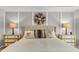 Comfortable main bedroom featuring designer lamps, decorative pillows, and stylish decorations at 660 Briarleigh Way, Woodstock, GA 30189